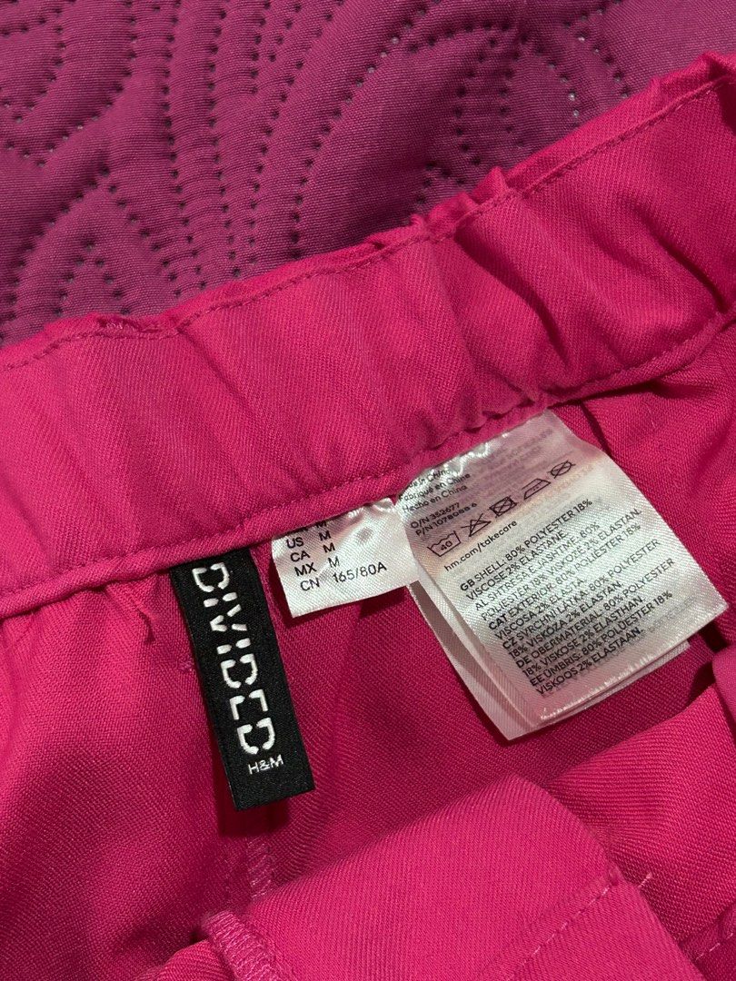 h&m hot pink trousers (m) (Category: Other Bottoms) located in Mabalacat. Submitted by icedoatmatcha (Listing ID 1376428620, Image 3). Description: ‼️ BUY 2 OR MORE FROM MY LISTINGS AND GET FREE SHIPPING h&m hot pink trousers (m) - only worn twice - M on tag but it has a garterized waistband on the back so it still comfortably fit my usually L-XL frame - has a stain on one of the bottom hems 📍 pampanga.
