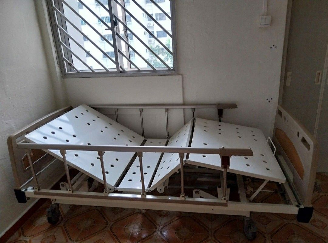 Hospital Bed with Mattress (Category: Other Assistive Aids) located in Singapore. Submitted by buriedtreasure (Listing ID 1376604407, Image 3). Description: If you can afford & do not have financial challenges, we are selling this for $100. However, we are also blessing/giving to whoever might need this bed as a caregiver. The bed is in good condition. These beds are expensive, we understand that. So we decided we wanted to give & bless some fami