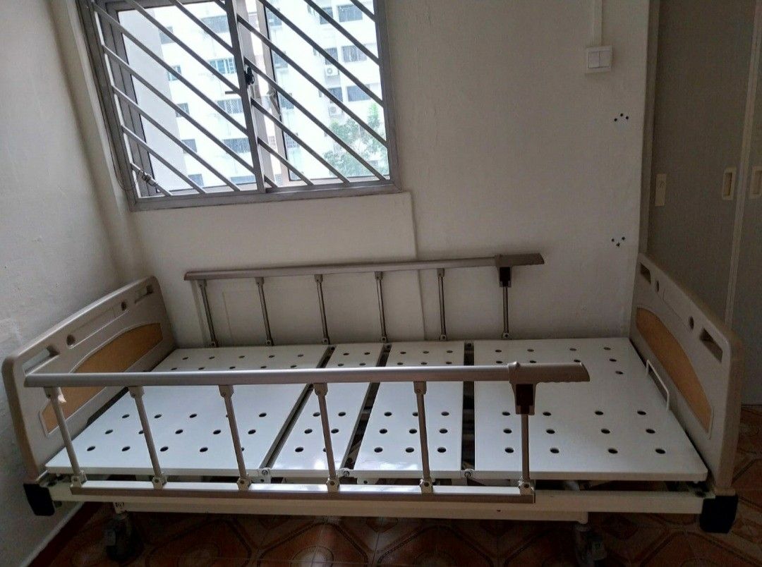 Hospital Bed with Mattress (Category: Other Assistive Aids) located in Singapore. Submitted by buriedtreasure (Listing ID 1376604407, Image 2). Description: If you can afford & do not have financial challenges, we are selling this for $100. However, we are also blessing/giving to whoever might need this bed as a caregiver. The bed is in good condition. These beds are expensive, we understand that. So we decided we wanted to give & bless some fami