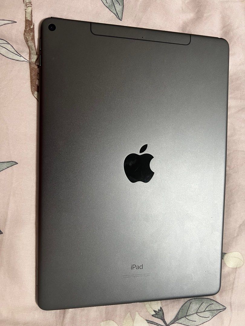 (Category: iPad) located in Singapore. Submitted by catlover09_rabbit (Listing ID 1376483502, Image 2). Description: - iPad Air 3rd Generation with Wi-Fi and cellular - Includes original box and charging cable - Screen protector pre-applied - Minor cosmetic wear on one corner - Fully functional and ready for setup.