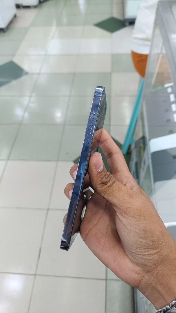 iPhone 13 Pro Max 512GB 97% BH Openline Ntc Approved complete (Category: iPhone 13 Series) located in Manila. Submitted by benshop. (Listing ID 1376541039, Image 2). Description: SALE OR SWAP !! iPhone 13 Pro Max 512GB Blue ✅ 97% Batt Health ✅ With Box Same IMEI ✅ NTC approved ✅ Openline ✅ No repair or replacement history ✅ No dents, scratches. Makinis ✅ Face ID, True Tone, iCloud Asking Price: 34k Only Open for swap lower/higher unit IOS/Android