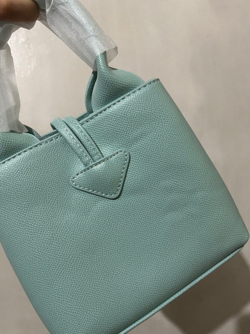 Longchamp Le Roseau S Tiffany (Category: Luxury Bags & Wallets) located in Quezon City. Submitted by hollyyybac25473 (Listing ID 1376507010, Image 2). Description: Longchamp Le Roseau Size: S Color: Tiffany w/ sling & dustbag Rfs: will keep black ver. Actual photos posted. Can still nego for sure buyer. 📍East ave, QC.