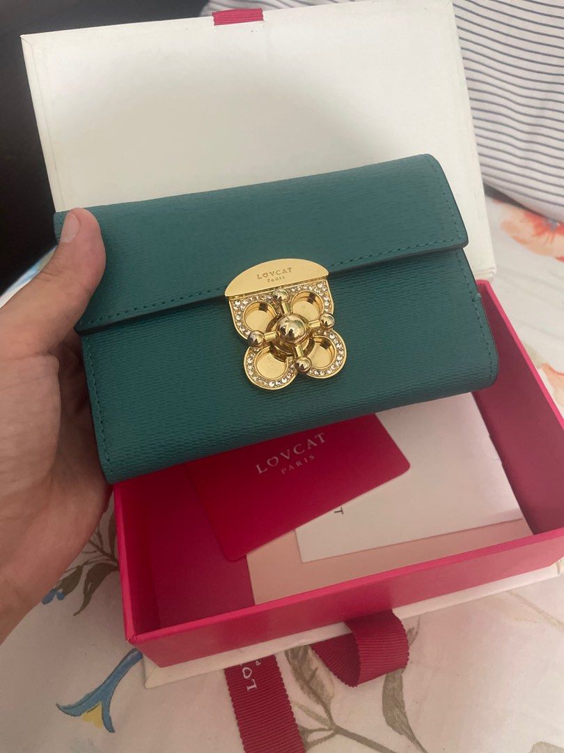 Lovcat wallet (Category: Wallets & Card holders) located in Taytay. Submitted by welloveditems (Listing ID 1376473597, Image 1). Description: Selling my preowned LOVCAT PARIS medium wallet in very good condition No issue or flaws Rfs: extra wallet Loc: Taytay Rizal.