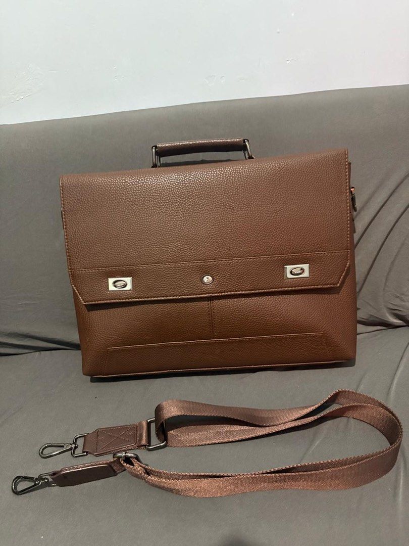 McJiM Laptop Bag - never used (Category: Laptop Bags & Sleeves) located in Manila. Submitted by mr01044 (Listing ID 1376494460, Image 1). Description: McJIM Formal shoulder Bag 1.3k only - good as new never nagamit Orig mall price 6k - selling for only 1.3 Makinis no signs of usage never nagamit No issue good as new.