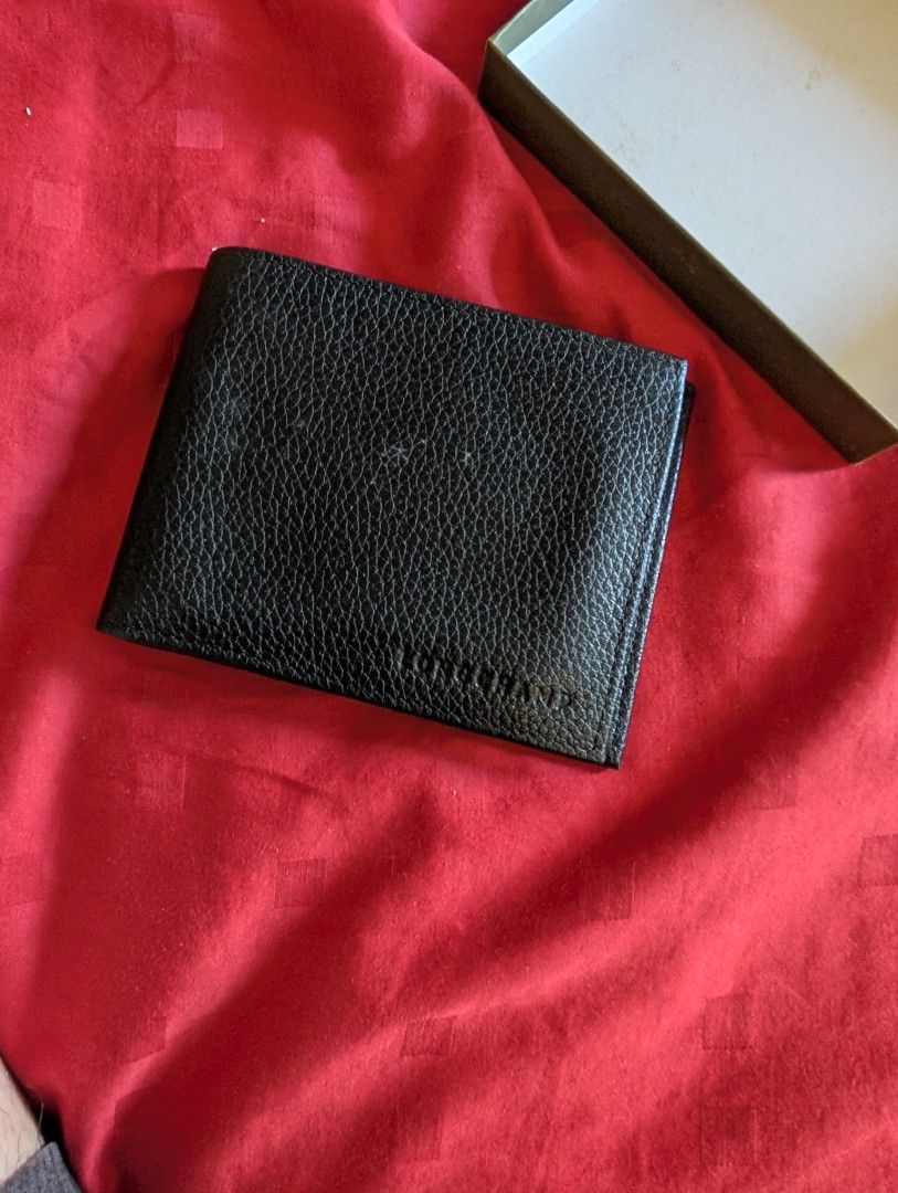 Longchamp Men leather wallet (Category: Bags & Wallets) located in Singapore. Submitted by fastsell999 (Listing ID 1376517890, Image 1). Description: bought for dad but dad never uses it coin purse.