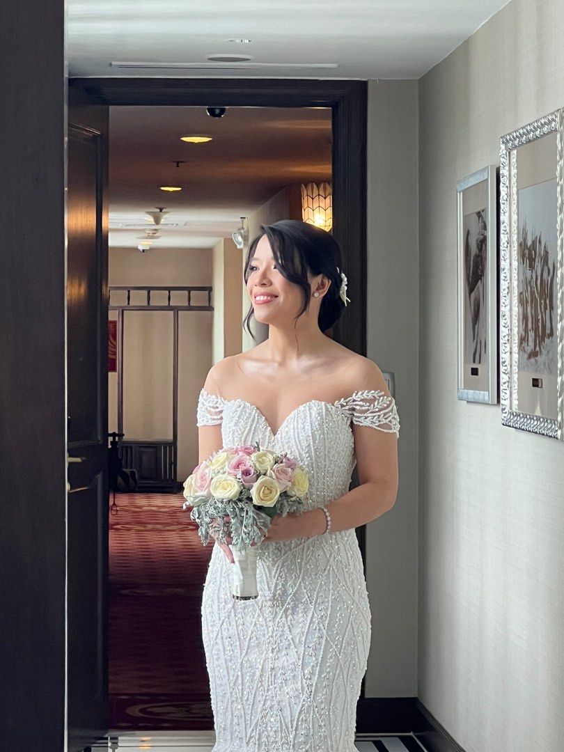 Mermaid wedding gown with sleeves (Category: Evening dresses & gowns) located in Makati City. Submitted by getinstyle (Listing ID 1376429900, Image 1). Description: Used last May 31, 2025 Got so many compliments from guests Waist 27 Please refer to the last photo for more detailed measurements .