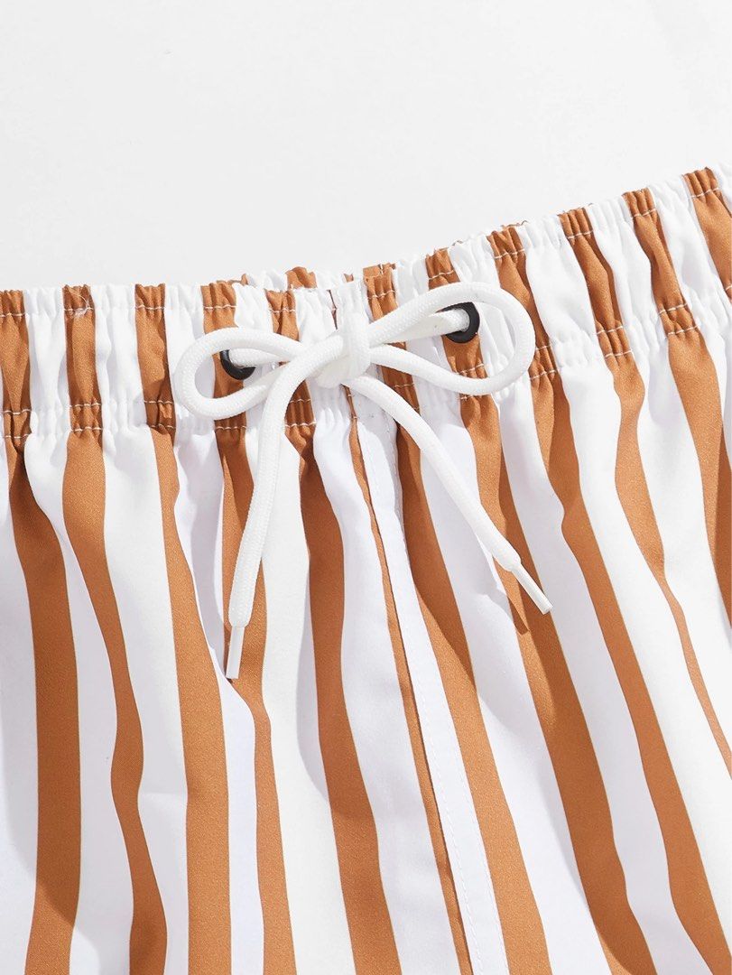 Mustard & White Striped Drawstring Swim Trunks Fits Small to Medium (Category: Swim Trunks & Board Shorts) located in Paranaque City. Submitted by lou-dime (Listing ID 1376470969, Image 3). Description: Mustard & White Striped Drawstring Waist Swim Trunks Size: Small to Medium Length: 16.5 in Waist Size: 28-39 in Hip Size: 42.9.