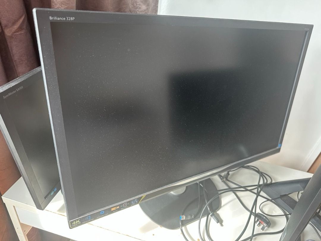 Philips 328P Monitor (Category: Monitor Screens) located in Singapore. Submitted by andyinchengdu-50116 (Listing ID 1376504632, Image 1). Description: Philips 328P 32" monitor. Features a black bezel and stand. Includes power cable. Has some horizontal lines defects, unsure if it is hardware or software issue, so being sold cheap..