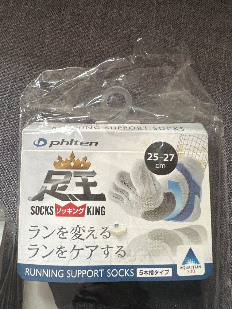Phiten running support toe socks (Category: Braces, Support & Protection) located in Singapore. Submitted by itsybtsy (Listing ID 1376480039, Image 3). Description: Brand new in packaging and sealed Two design Size 25-27cm Available 4 pieces Retail $30 each Can send by post.