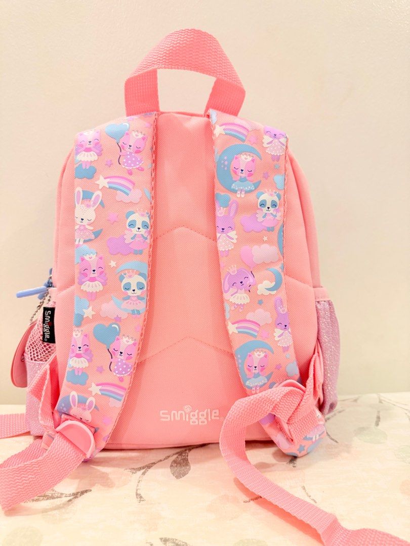 Smiggle Wink Teeny Tiny Backpack (Category: Backpacks) located in Santa Maria. Submitted by stuff4less07 (Listing ID 1376534030, Image 2). Description: Smiggle Singapore This super cute backpack from the Wink collection is perfect for preschool and toddlers. Three zipped compartments - main compartment with double zips Dual drink bottle sleeves Padded adjustable shoulder straps Carry handle Internal slip pocket Internal name label Polyester (cove