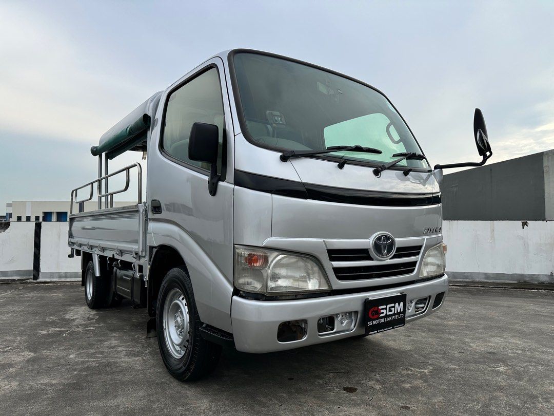 Toyota Dyna 150 (Category: Used Commercial Vehicles for Sale) located in Singapore. Submitted by sgmpteltd (Listing ID 1376492076, Image 1). Description: 📱：96499067（ELYN） Only one owner! New paint work! Come with retractable canopy! Excellent condition! Engine & gearbox well maintain! High trade in welcome Address: 15 Yishun Industrial Street 1, #01-08 Win 5, Singapore 768091.