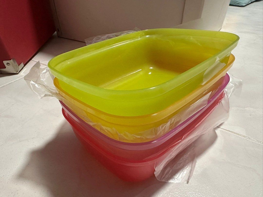 Tupperware Containers (Category: Other Kitchenware & Tableware) located in Singapore. Submitted by fattybombom37 (Listing ID 1376565757, Image 1). Description: BRAND NEW ITEM FOR SALE $5 EACH 4 COLOURS AVAILABLE 16cm x 12cm PM NOW FOR FAST DEAL MANY TUPPERWARE ITEMS FOR SALE.