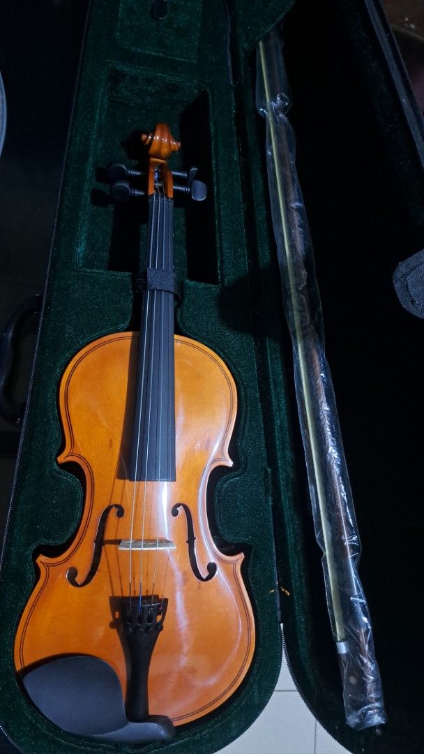 Violin Complete w/ Freebie Clip Tuner (Category: Musical Instruments) located in Manila. Submitted by cyj08 (Listing ID 1376510803, Image 3). Description: Good as new. Used only 2 - 3 times Price Negotiable Delivery by buyer.