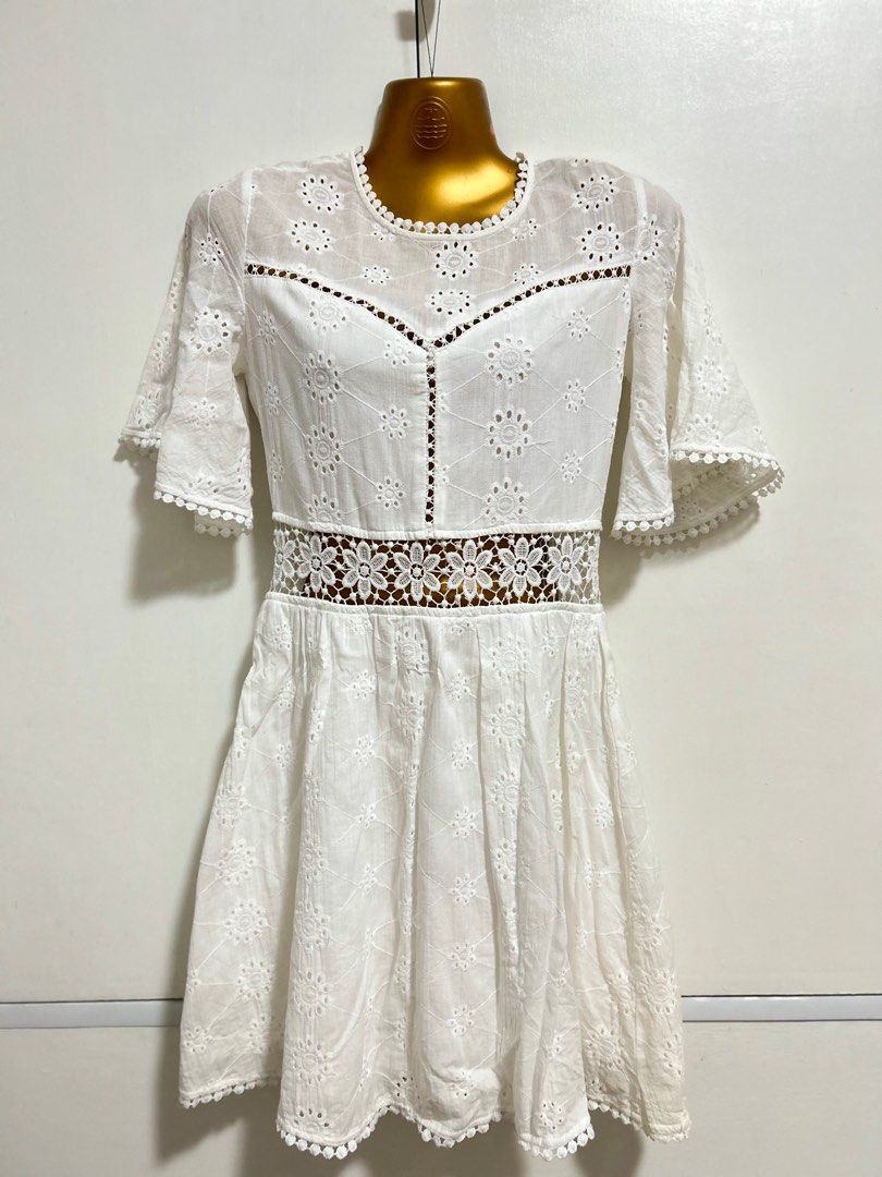 white eyelet dress (Category: Dresses) located in Marikina City. Submitted by solarkae (Listing ID 1376531945, Image 1). Description: small stain at the bottom (see 2nd pic) super love this but it doesn’t fit me anymore:(.