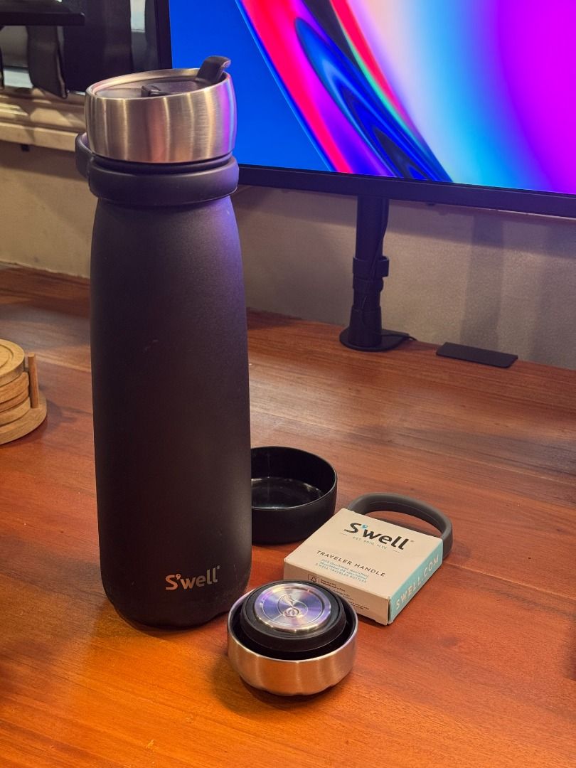 * Swell Triple Layered Traveller (1.2L) (Category: Water Bottles & Tumblers) located in Pasig City. Submitted by nargalzius (Listing ID 1376717192, Image 1). Description: - Comes as pictured - Onyx Black, Stone textured Extras: - Spare Original Swell Traveller Handle - Original Swell Commuter Lid - Bottle Bumper.