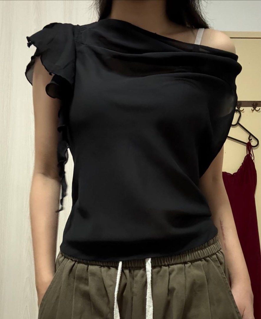 Black Asymmetrical Neck Sleeveless Blouse (Category: Blouses) located in Singapore. Submitted by cherrymocha (Listing ID 1376683136, Image 2). Description: .