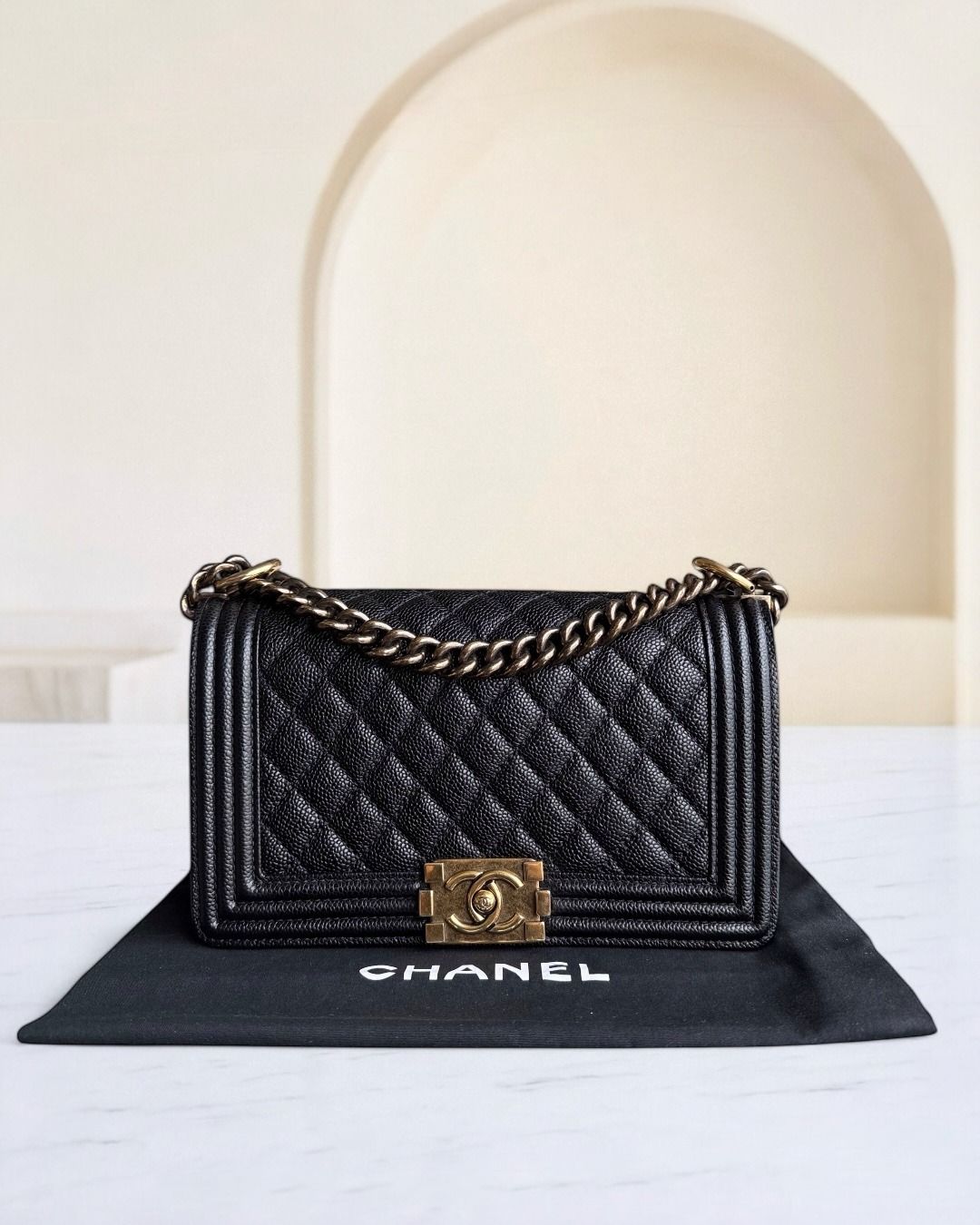 Chanel Boy Medium - Caviar 25CM Quilted Grained Calfskin Black Gold Hardware Series 20 (Category: Bags & Wallets) located in Singapore. Submitted by luxuryevermore (Listing ID 1376783085, Image 1). Description: Chanel Boy Medium - Caviar 25CM Quilted Grained Calfskin Black Gold Hardware Series 20 More details: https://luxuryevermore.com/products/chanel-boy-medium-caviar-25cm-quilted-grained-calfskin-black-gold-hardware-series-20.