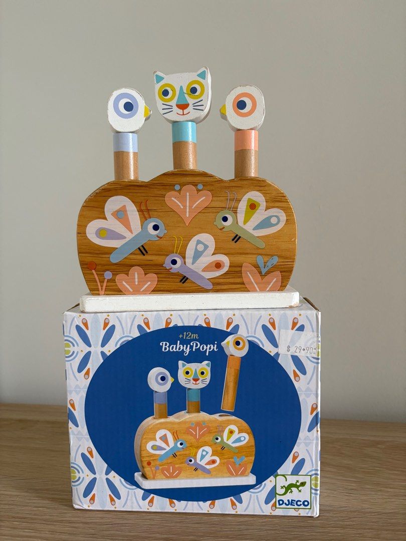 Djeco Baby Popi Wooden Toy (Category: Infant Playtime) located in Singapore. Submitted by shdy01 (Listing ID 1376810757, Image 1). Description: Adorable Djeco Baby Popi wooden toy. Suitable for babies 12 months and up. Features cute animal characters and a fun design. Comes with original box..