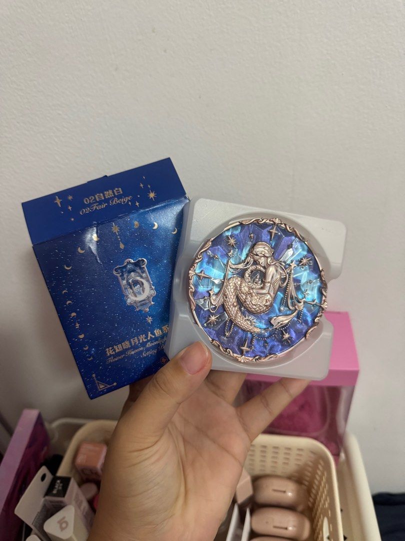 Flower Knows mermaid collection pressed powder (Category: Makeup) located in Cavite. Submitted by kaokao_declutter (Listing ID 1376680765, Image 2). Description: Flower knows mermaid collection pressed powder in 02 Fair beige, it comes with the puff as well as the original box (water damaged box).