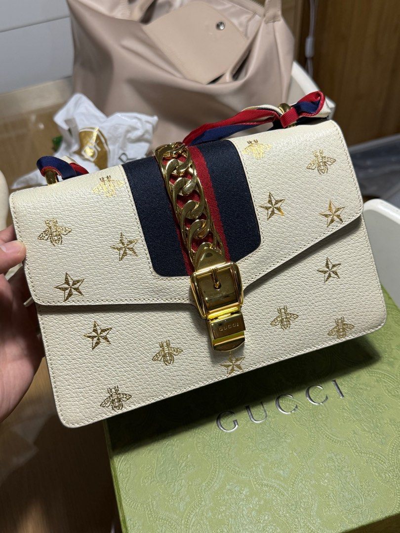 Gucci Preowned 2016-2024 Small Bee Star Sylvie (Category: Luxury Bags & Wallets) located in Taguig. Submitted by gabby33.rocky29 (Listing ID 1376790705, Image 1). Description: 🐝 Purchased in Paris in 2024 🐝 Barely used 🐝 Quality 9/10 🐝 Complete with cards, dust bag, paper bag and box 🐝 RFS: No more space 🐝 No to swap but price may be negotiable.