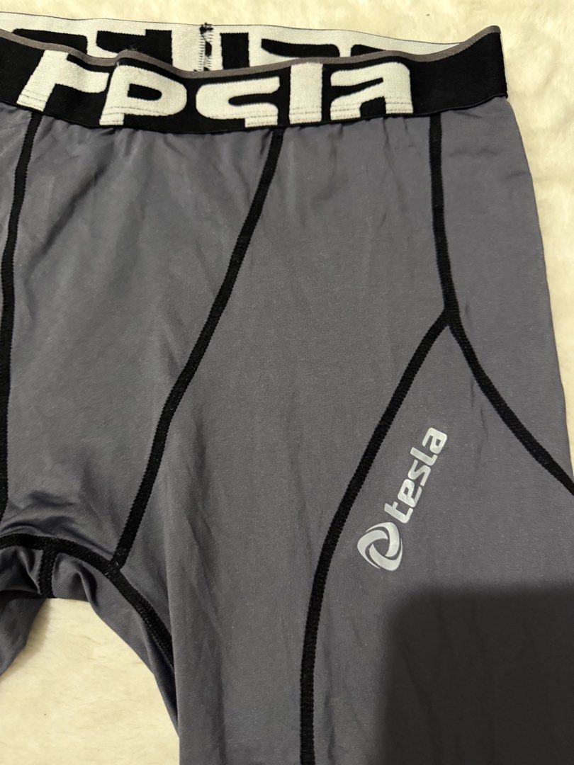 Tesla Grey Compression Pants - Large (Category: Activewear) located in Manila. Submitted by meisu_mnl (Listing ID 1376751573, Image 2). Description: 🔥 Tesla Compression Pants 🔥 Excellent condition / Like New athletic leggings perfect for gym, running, training and sports activities. Brand: Tesla Size: Large Waist: 26-36 inches Length: 33 inches Color: Gray Condition: Like New ✔ Stretchable compression fabric ✔ Lightweight and breathable ✔ Comfo