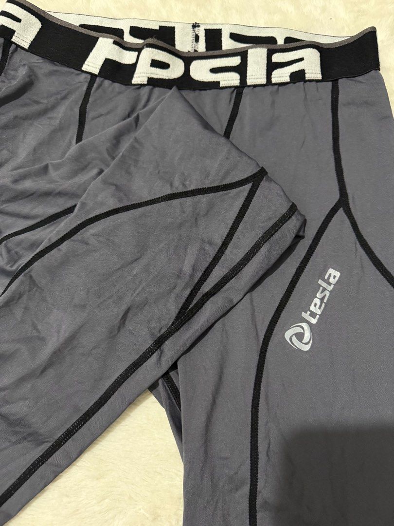 Tesla Grey Compression Pants - Large (Category: Activewear) located in Manila. Submitted by meisu_mnl (Listing ID 1376751573, Image 3). Description: 🔥 Tesla Compression Pants 🔥 Excellent condition / Like New athletic leggings perfect for gym, running, training and sports activities. Brand: Tesla Size: Large Waist: 26-36 inches Length: 33 inches Color: Gray Condition: Like New ✔ Stretchable compression fabric ✔ Lightweight and breathable ✔ Comfo