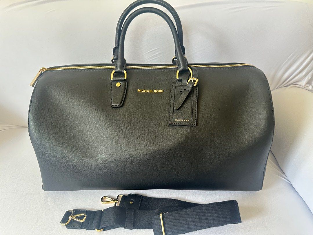MK Michael Kors Jet Set Travel Weekender (Category: Luxury Bags & Wallets) located in San Fernando. Submitted by mabeljoycemj (Listing ID 1376800682, Image 1). Description: AUTHENTIC FROM MK RETAIL SHOP IN DUBAI Color: Black .