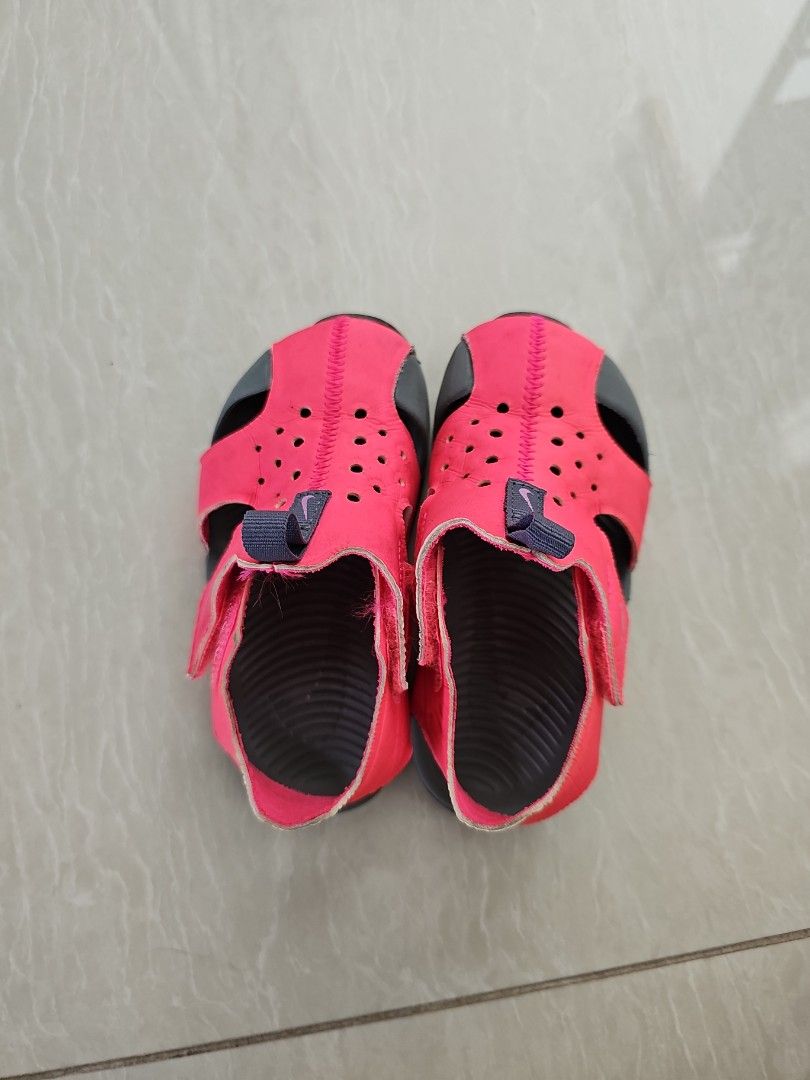 Nike Kids' Sandals Size 9 (Category: Babies & Kids Fashion) located in Singapore. Submitted by saiwan5152 (Listing ID 1376688163, Image 1). Description: Pink Nike kids' sandals. Size UK 9, US 9C, CM 25. Adjustable straps. Perfect for summer..