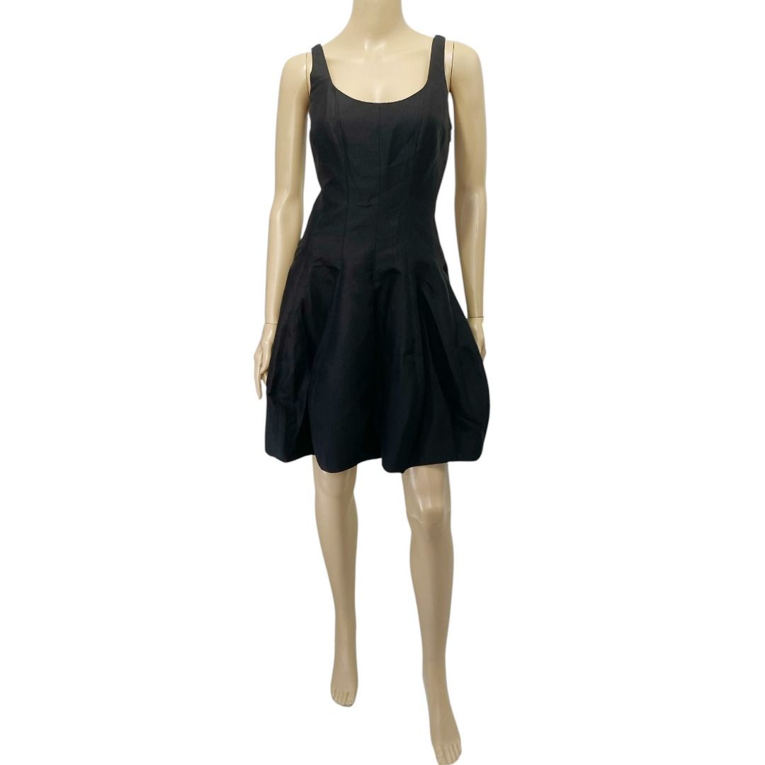NWT Halston Heritage Black Structured Tulip Dress (Category: Dresses) located in Cebu City. Submitted by posh_avenue888 (Listing ID 1376773458, Image 3). Description: New with tags. Size 0 (fits small). Fabric is cotton/silk blend. 100% authentic!!! Measurements (estimated-taken flat): Armpit: 16 inches; Waist: 13 inches; Length: 33 inches. #BlackDressesBluePlastic2.