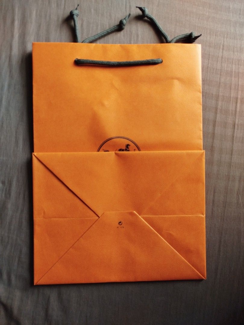 Original Hermes Paper Bag (Category: Everything Else Others) located in Caloocan City. Submitted by edlan_23 (Listing ID 1376663834, Image 2). Description: Original Hermes Paper Bag length: 13 3/4 inches width: 9 3/4 inches.