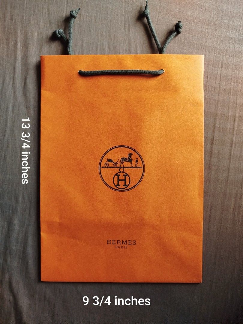 Original Hermes Paper Bag (Category: Everything Else Others) located in Caloocan City. Submitted by edlan_23 (Listing ID 1376663834, Image 1). Description: Original Hermes Paper Bag length: 13 3/4 inches width: 9 3/4 inches.
