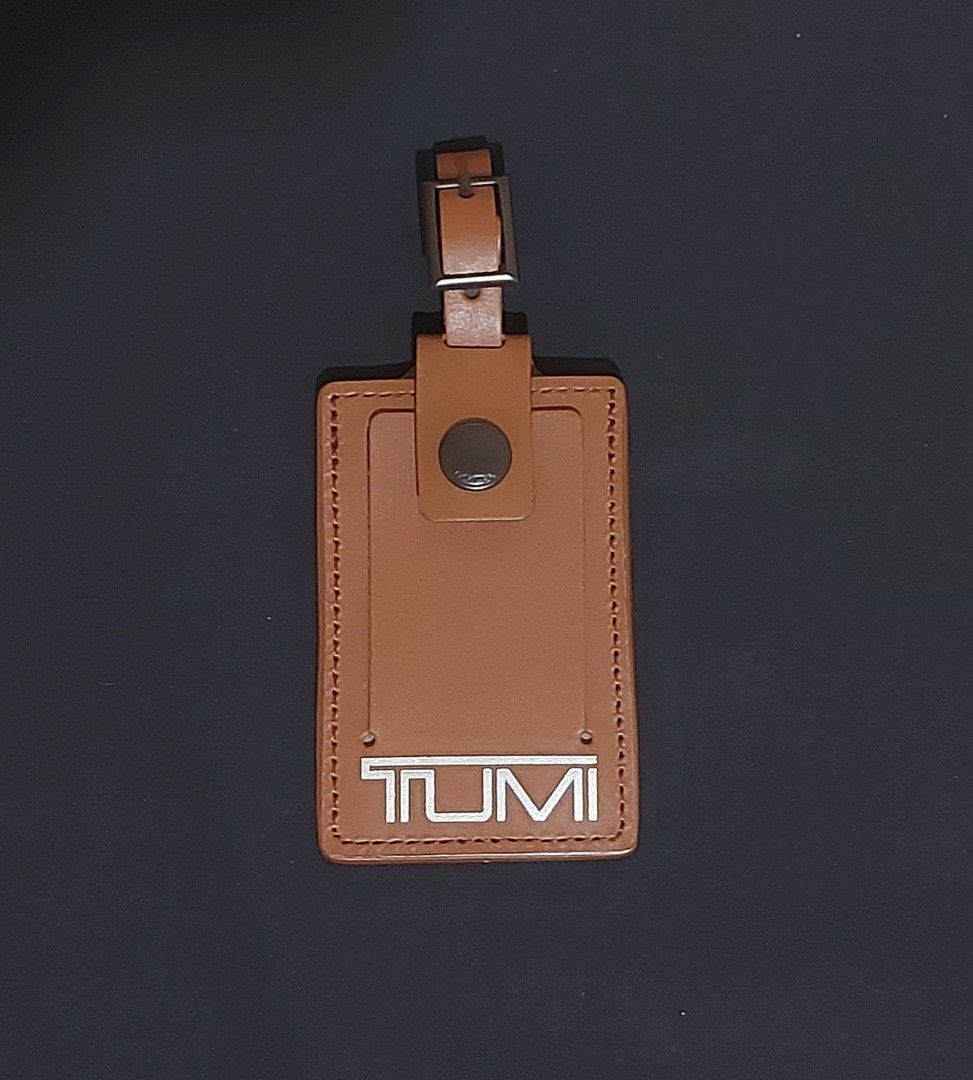 Original TUMI Leather Luggage Tag Brown (Category: Luxury Accessories) located in Pasay City. Submitted by itemsforsale00 (Listing ID 1376803176, Image 1). Description: - Gcash payments only. - Delivery fee is shouldered by buyer. (Lalamove) - Metro Manila Area Only - NO Return. NO Exchange..