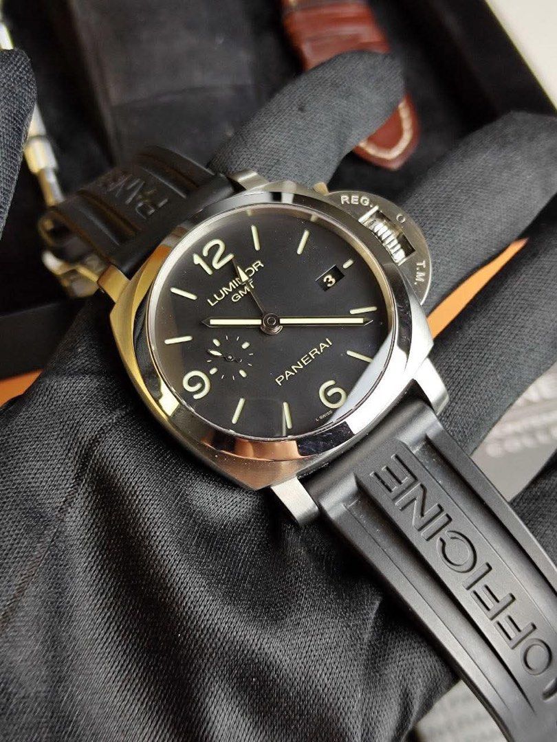 Panerai GMT (Category: Luxury Watches) located in Quezon City. Submitted by marc4x (Listing ID 1376787574, Image 2). Description: Panerai Luminor 1950 GMT PAM 320 2012 Excellent condition 9.5/10 Comes with box sleeve, original box, manual, certificate and 2 Original Panerai straps (A really nice brown leather bracelet & Black rubber bracelet) Will also throw in red and blue rubber straps for free 245k Rolex patek breitling tag Heuer ap hublot Car