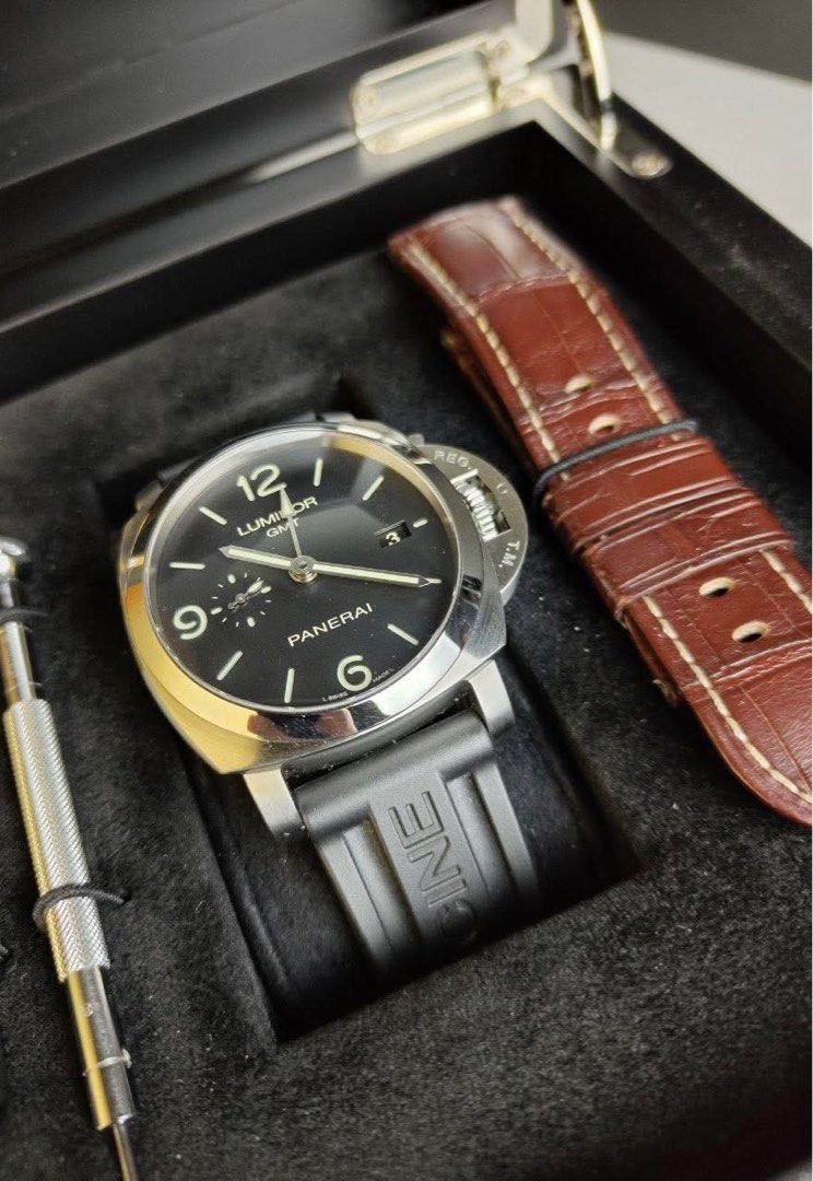 Panerai GMT (Category: Luxury Watches) located in Quezon City. Submitted by marc4x (Listing ID 1376787574, Image 1). Description: Panerai Luminor 1950 GMT PAM 320 2012 Excellent condition 9.5/10 Comes with box sleeve, original box, manual, certificate and 2 Original Panerai straps (A really nice brown leather bracelet & Black rubber bracelet) Will also throw in red and blue rubber straps for free 245k Rolex patek breitling tag Heuer ap hublot Car