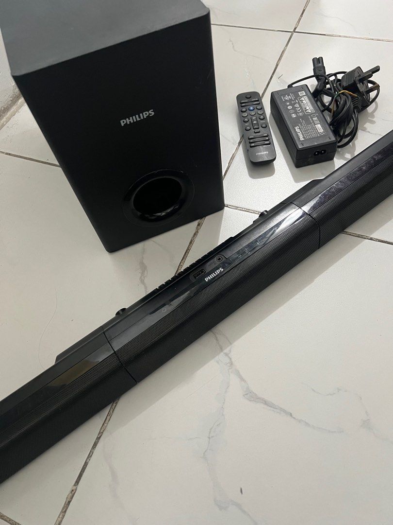 PHILIPS Soundbar speaker (Category: Soundbars, Speakers & Amplifiers) located in Cavite. Submitted by letsgosab (Listing ID 1376662571, Image 1). Description: PHILIPS Soundbar Speaker Model: HTL2193B/98 Enhance your audio experience with this powerful Philips soundbar – perfect for movies, music, and more. Inclusions: ✔️ Remote ✔️ Power adaptor .