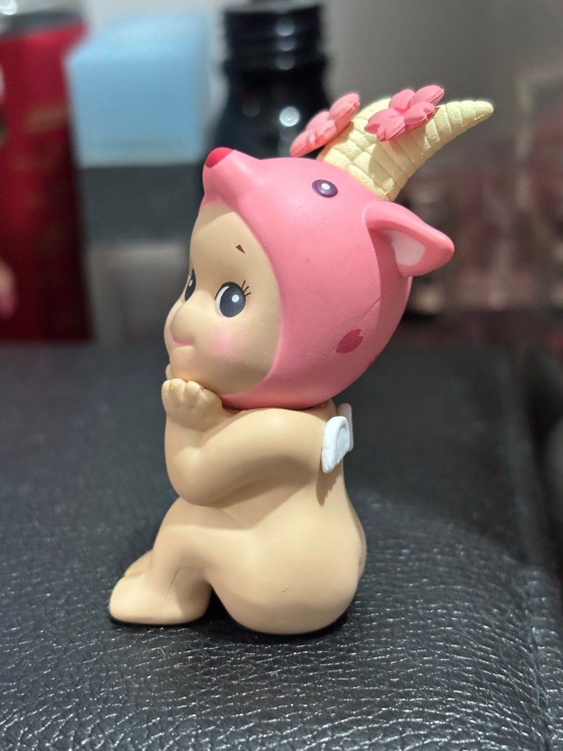 Sonny Angel Cherry Blossom Goat (Category: Designer & Blind Box Toys) located in Pasig City. Submitted by eracurates (Listing ID 1376759014, Image 3). Description: displaced in an acrylic box after opening.