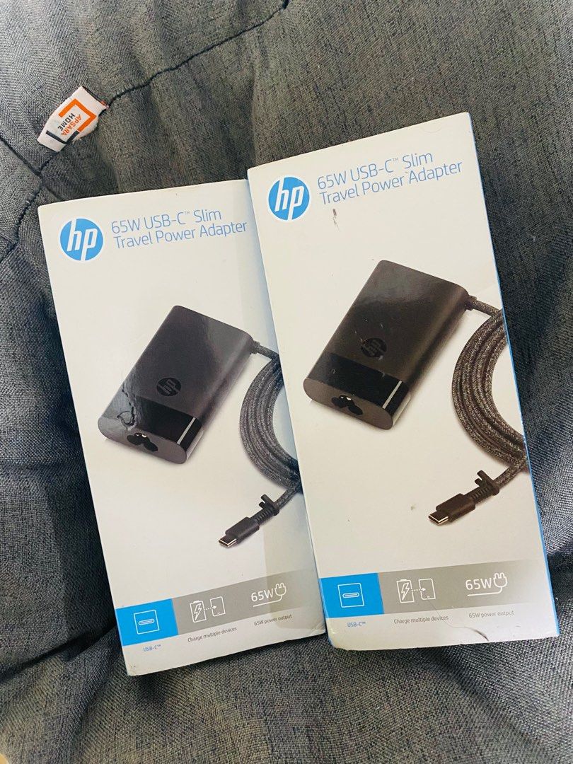 Type C Laptop Charger / USB-C Slim Travel Charger (Category: Chargers) located in Antipolo. Submitted by prelovedByYsabelle (Listing ID 1376701907, Image 2). Description: HP Type C charger, compatible with most type C interfaces. Perfect for travellers. Slim and fabric cable (wear resistant) see last photo. Original and brand new. Priced ₱879 in the Orange app. .