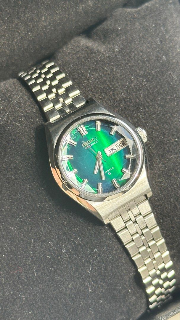Vintage Seiko Ladies Automatic Hexagon Emerald Green (Category: Women's Watches) located in Singapore. Submitted by comeonfundmepls (Listing ID 1376766011, Image 3). Description: - metal strap - hexagon crystal face - crystal face in great condition (very tiny scratch at the bottom right corner not very visible unless zoom in) - emerald green - kanji and English day wheel - pictures taken under sunlight and indoor.