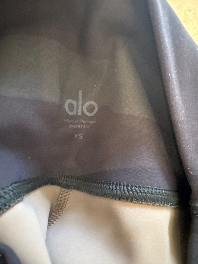 Alo Yoga Camo Leggings - XS (Category: Activewear) located in Singapore. Submitted by pinkcandyfloss123 (Listing ID 1376845030, Image 3). Description: Alo Yoga camo leggings, size XS. High-waisted. Made in Portugal. Please note: some pilling on both sides (see photos)..