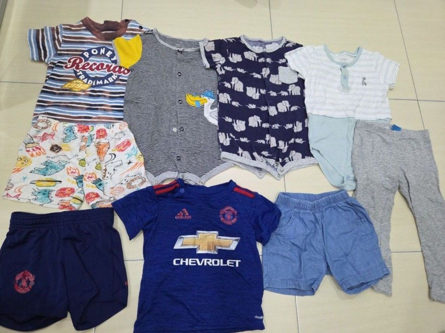 Baby Clothes Bundle for baby boy (Category: Babies & Kids Fashion) located in Singapore. Submitted by missswirly (Listing ID 1376952966, Image 1). Description: - Mixed bundle of baby clothes - Includes tops, shorts, and pants - self collect from sengkang central - Perfect for everyday wear.