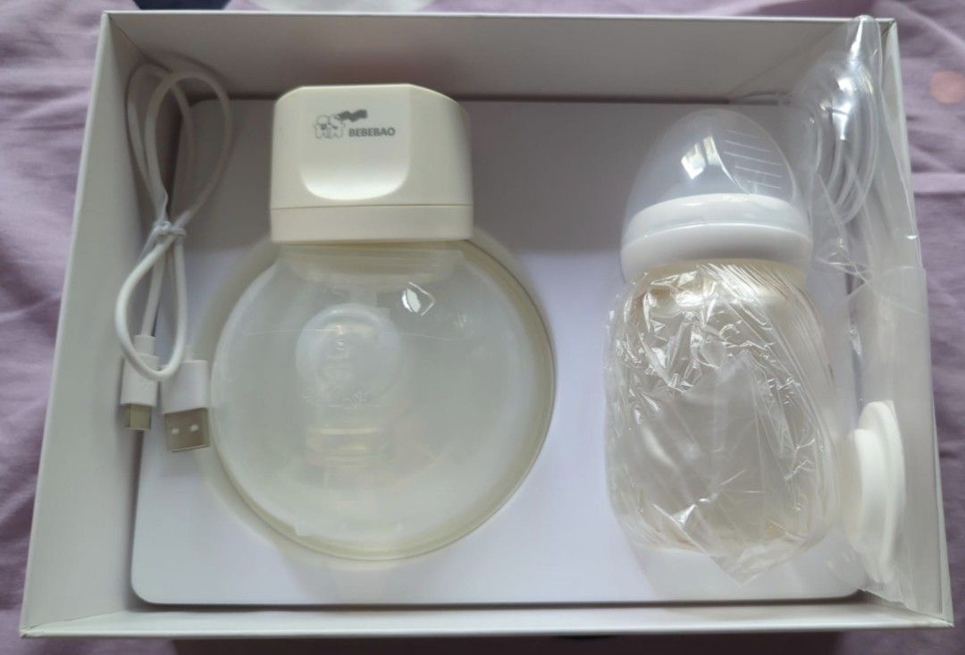 Bebebao Portable Electric Breast Pump (Model: FZ02) (Category: Breastfeeding & Bottle Feeding) located in Singapore. Submitted by littleonesdaily (Listing ID 1376922888, Image 2). Description: Letting go portable Bebebao pump (model: FZ02) at $80 for a pair. I will change all the accessories before letting go. Only used it for 4 months (was allowed to wfh) and kept it in the box. Each pump comes with a bebebao bottle which is brand new unused. De