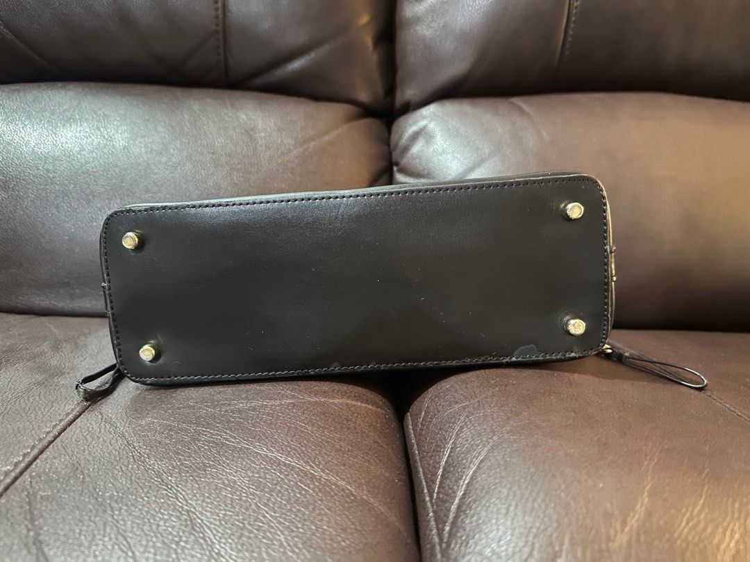 Coach Mini Alma Sling Bag (Category: Luxury Bags & Wallets) located in Quezon City. Submitted by luxpalace (Listing ID 1376848268, Image 3). Description: Coach Mini Alma (Sling or Top Handle Bag) Good condition, see pics 6,7,8 for issues. Rubbed handle and edges so selling low. But still looks good. Guaranteed authentic.