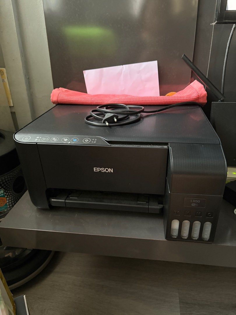 Epson Printer (Category: Printers, Scanners & Copiers) located in Singapore. Submitted by hweehong13 (Listing ID 1376960385, Image 1). Description: seldom used looks new; no visible damage everything on the last picture will be provided - 1 set of replacement ink.