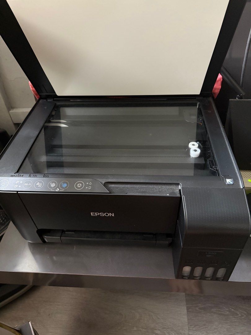 Epson Printer (Category: Printers, Scanners & Copiers) located in Singapore. Submitted by hweehong13 (Listing ID 1376960385, Image 2). Description: seldom used looks new; no visible damage everything on the last picture will be provided - 1 set of replacement ink.