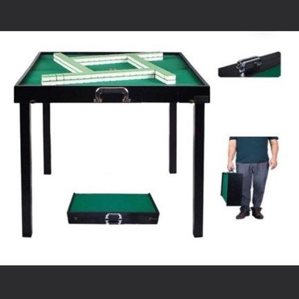 Foldable Compact Mahjong Table (Category: Tables & Sets) located in Singapore. Submitted by iamjesse (Listing ID 1376830459, Image 1). Description: Can be easily stored with legs that can be dismantled and put inside. In great working condition selling cause moving house. Self collect at tiong bahru market. .