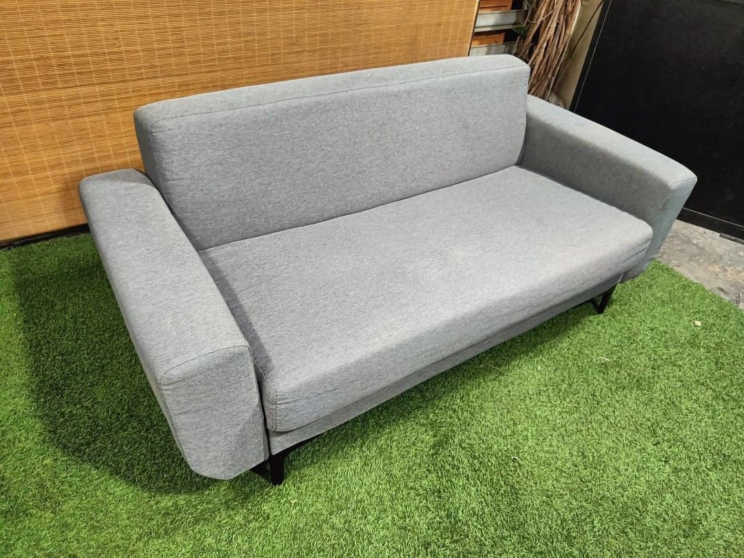 Gray Modern 3-Seater Chaise Sofa (Category: Sofas) located in Valenzuela. Submitted by jenelyn6 (Listing ID 1377004215, Image 2). Description: Gray Modern 3-Seater Chaise Sofa MINIMALIST!!! SUPER COMFY!!! Price : 11500 64L x 30W x 16H seat height inches Sandalan height 28 inches In VERY good condition Code HOMEBOSS.
