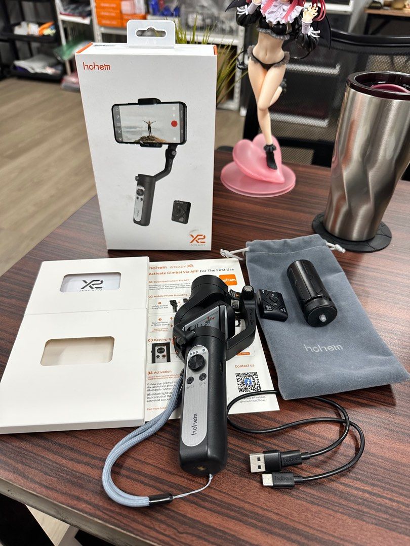 Hohem iSteady X2 smartphone gimbal (Category: Mounts & Holders) located in Quezon City. Submitted by jacchoa9 (Listing ID 1376931444, Image 2). Description: Bought it last 2024 sa UK. ✅complete accessories and box pa. Hindi laspag, Bihira gamitin since nun binili.. mas prefer namin DJI gamitin sa mga videos. Pwede nyo itest in person bago bilhin 📍Santol, Q.C. Gcash | bank transer | COP Lalamove | Pickup .
