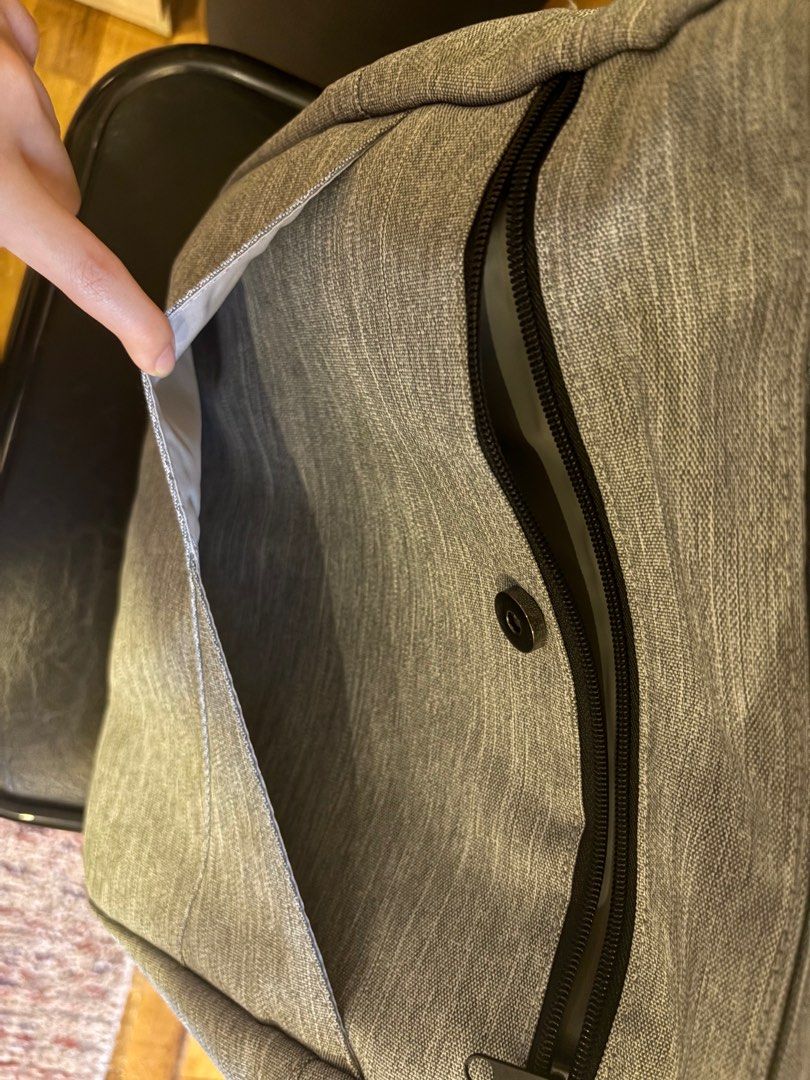 Jujube Core convertible Gray baby diaper backpack (Category: Diaper Bags & Wetbags) located in Manila. Submitted by chandleria (Listing ID 1376937748, Image 3). Description: selling jujube core convertible gray diaper backpack multi compartment very clean inside with minor flaw in zipper change working zipper and name.