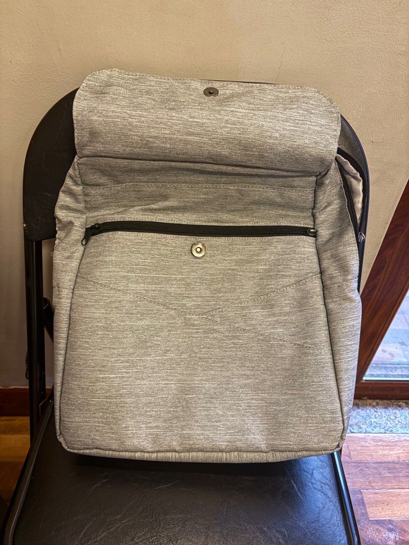 Jujube Core convertible Gray baby diaper backpack (Category: Diaper Bags & Wetbags) located in Manila. Submitted by chandleria (Listing ID 1376937748, Image 2). Description: selling jujube core convertible gray diaper backpack multi compartment very clean inside with minor flaw in zipper change working zipper and name.