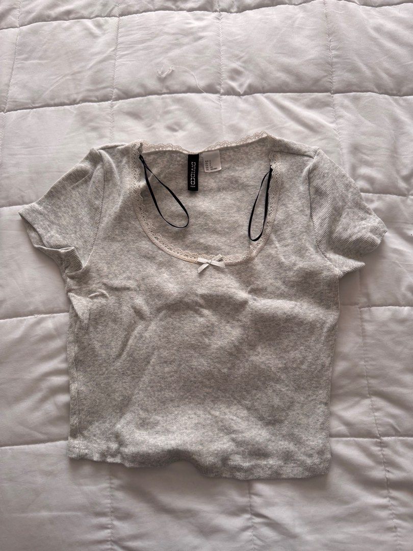 light grey coquette top h&m (Category: Shirts) located in Pasig City. Submitted by lovedpicks (Listing ID 1376839421, Image 2). Description: bought from h&m! fits small dm if interested <3.